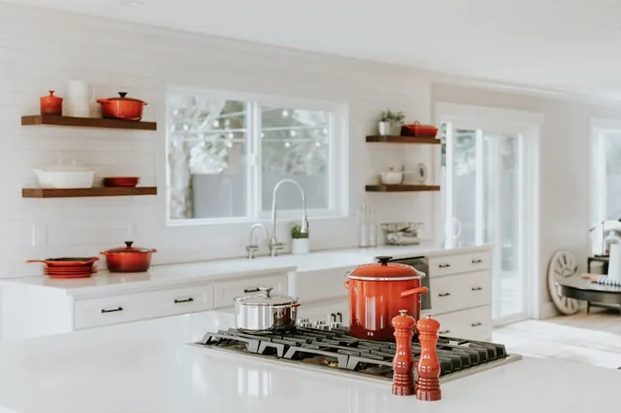 Bright kitchen with open shelving and spotless worktops