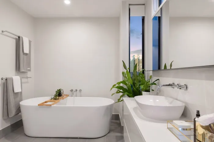 Elegant bathroom with freestanding bath and natural light