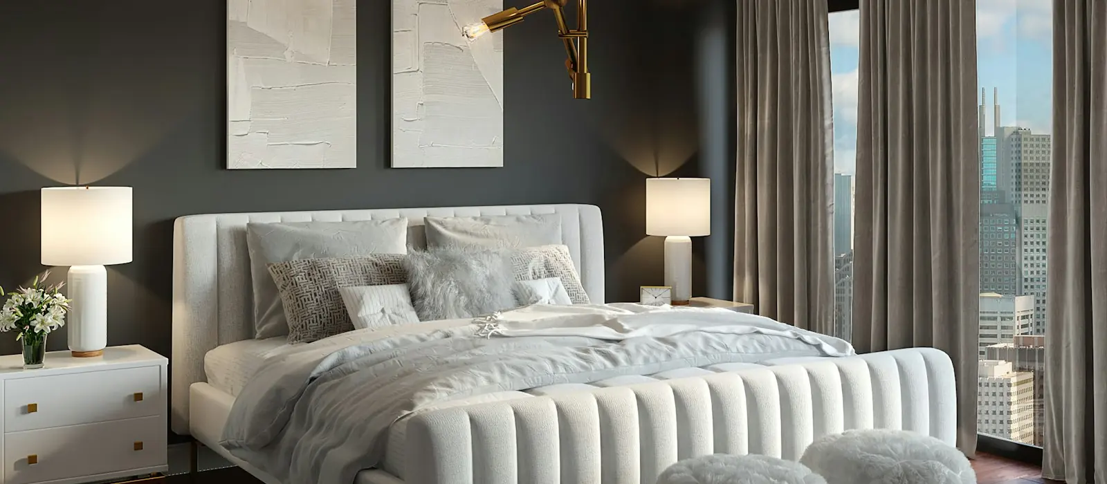 Immaculate bedroom with dressed bed and brass pendant lighting