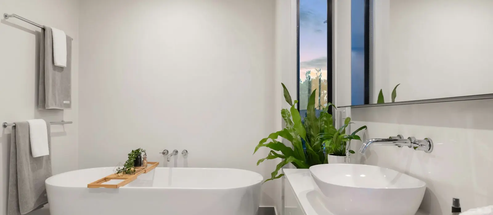 Elegant bathroom with freestanding bath and natural light